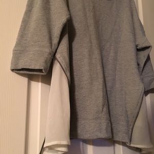 Anthropologie Sweatshirt with side zip and chiffon